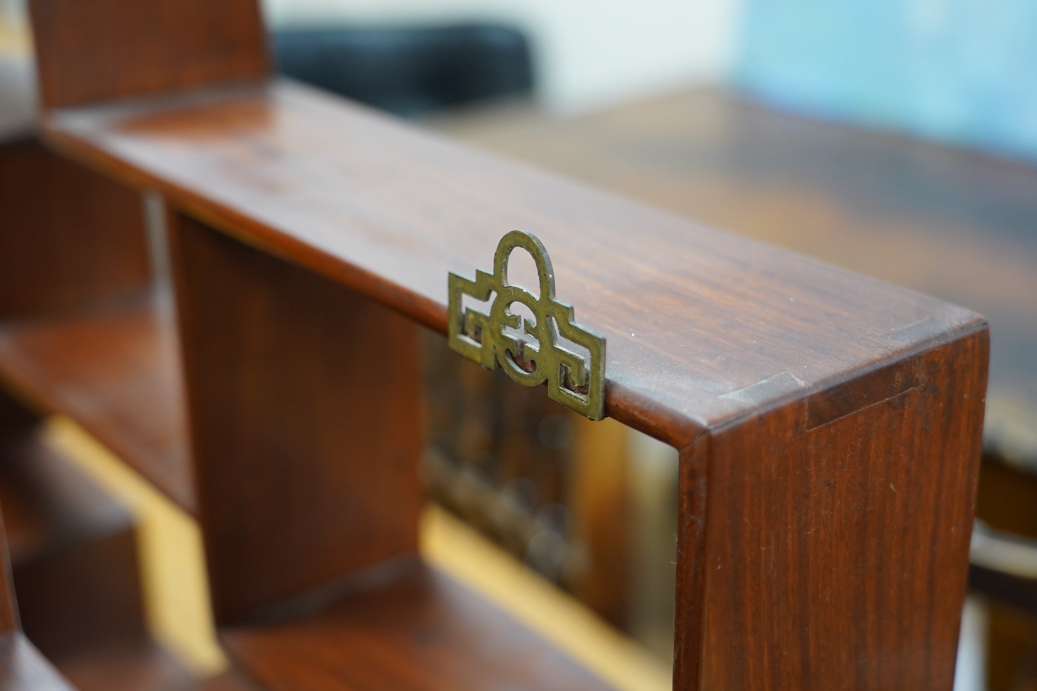 A pair of Chinese padouk wood display shelves, width 80cm, depth 10cm, height 51cm. Condition - fair